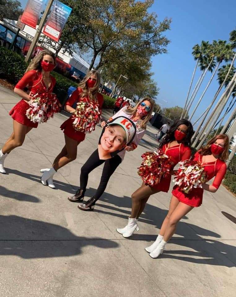 Randi Mahomes with Sophia's cutout with the Chiefs' cheerleaders.