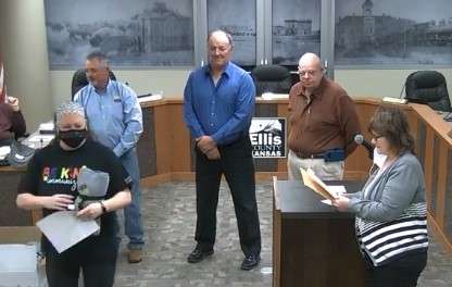 Laura Leiker , Ellis County Health Department employee, is thanked for her 10 years of service Monday night by county commissioners Neal Younger, Dean Haselhorst and Butch Schlyer, and Human Resource Generalist&nbsp;Janet Schmidt.