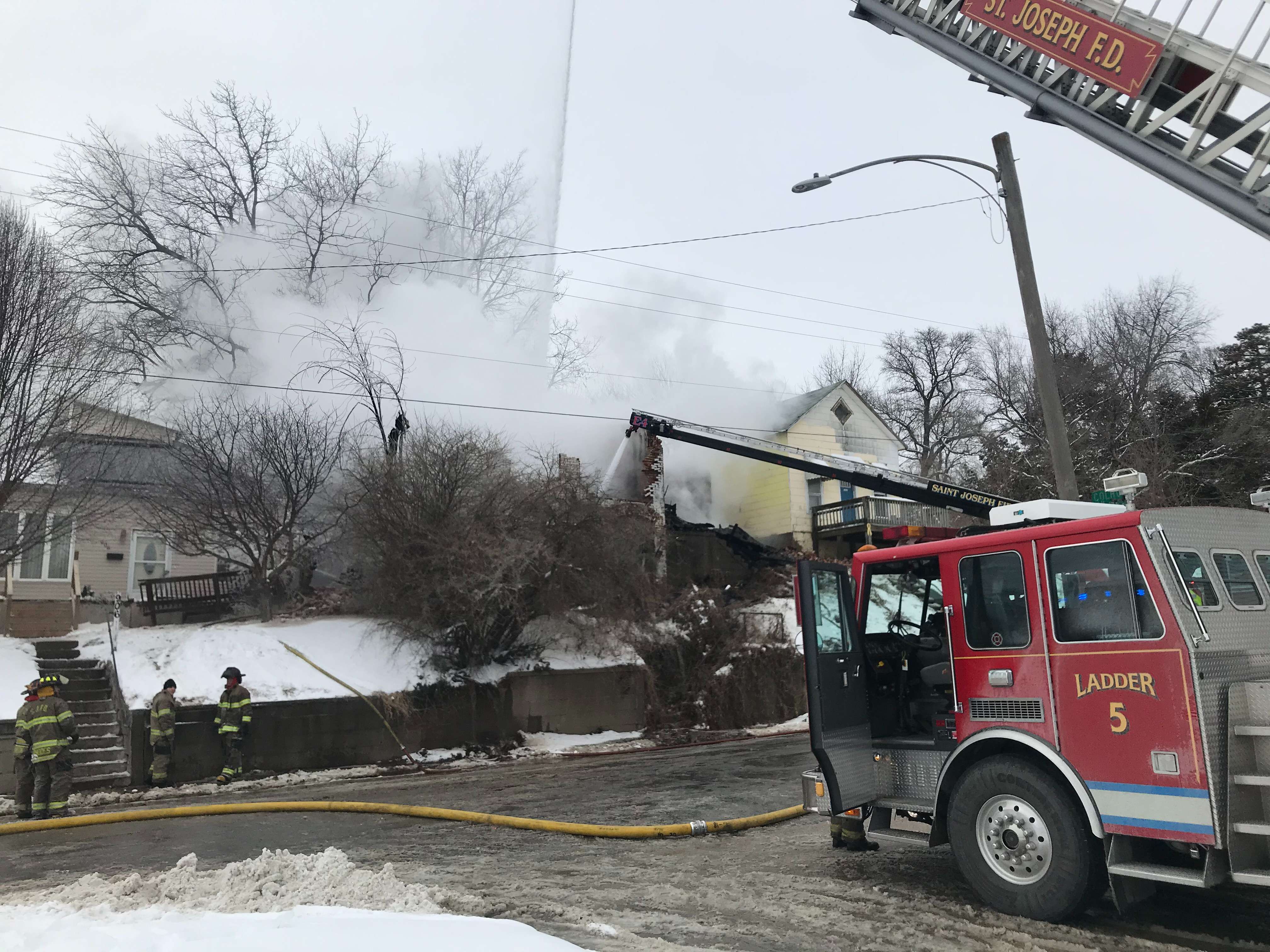 St. Joseph Fire crews battle a house fire at 17th and Colhoun on Tuesday afternoon. Photo by Tommy Rezac.