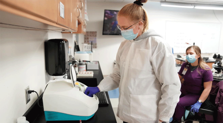 <i>North Platte Community College </i><i>medical laboratory technician student Molly Walker, of Kearney, uses a QBC STAR™ Dry Hematology System to run a complete blood count test Monday at NPCC. (Courtesy Photo)</i>