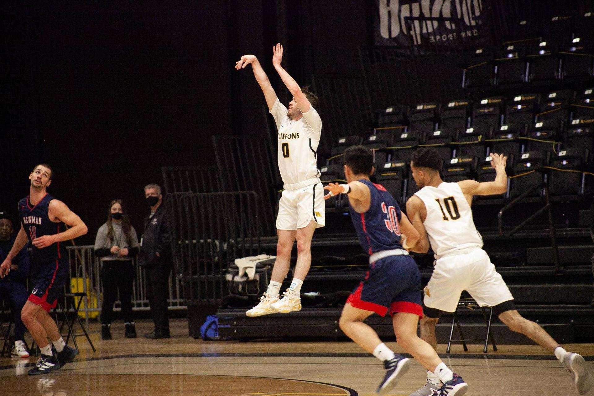 Reese Glover shoots for three in Missouri Western's 86-75 win over Newman at the MWSU Fieldhouse on Tuesday night. Photo via GoGriffons.com.