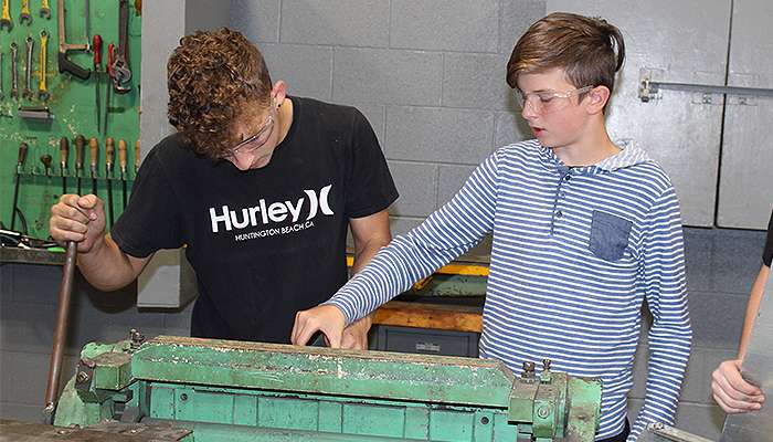 Students in HHS' metal shop. File photo