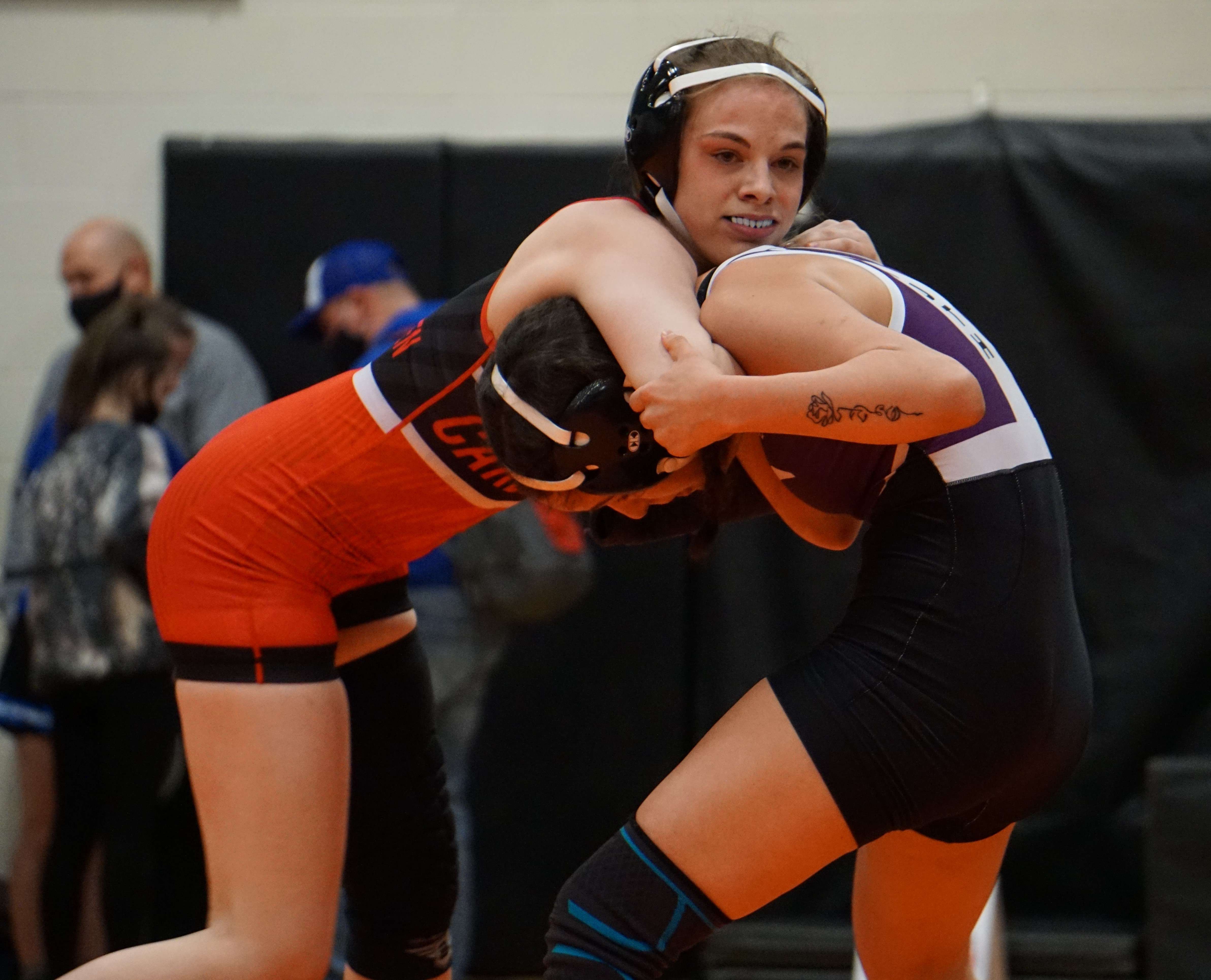 Benton's Lexi Pedersen (left) controls Park Hill South's Mystyque Anderson in the third place match of the 112-pound bracket in Saturday's Class 1 Section 4 girls' wrestling meet at Platte County High School Saturday. Photo by Tommy Rezac.