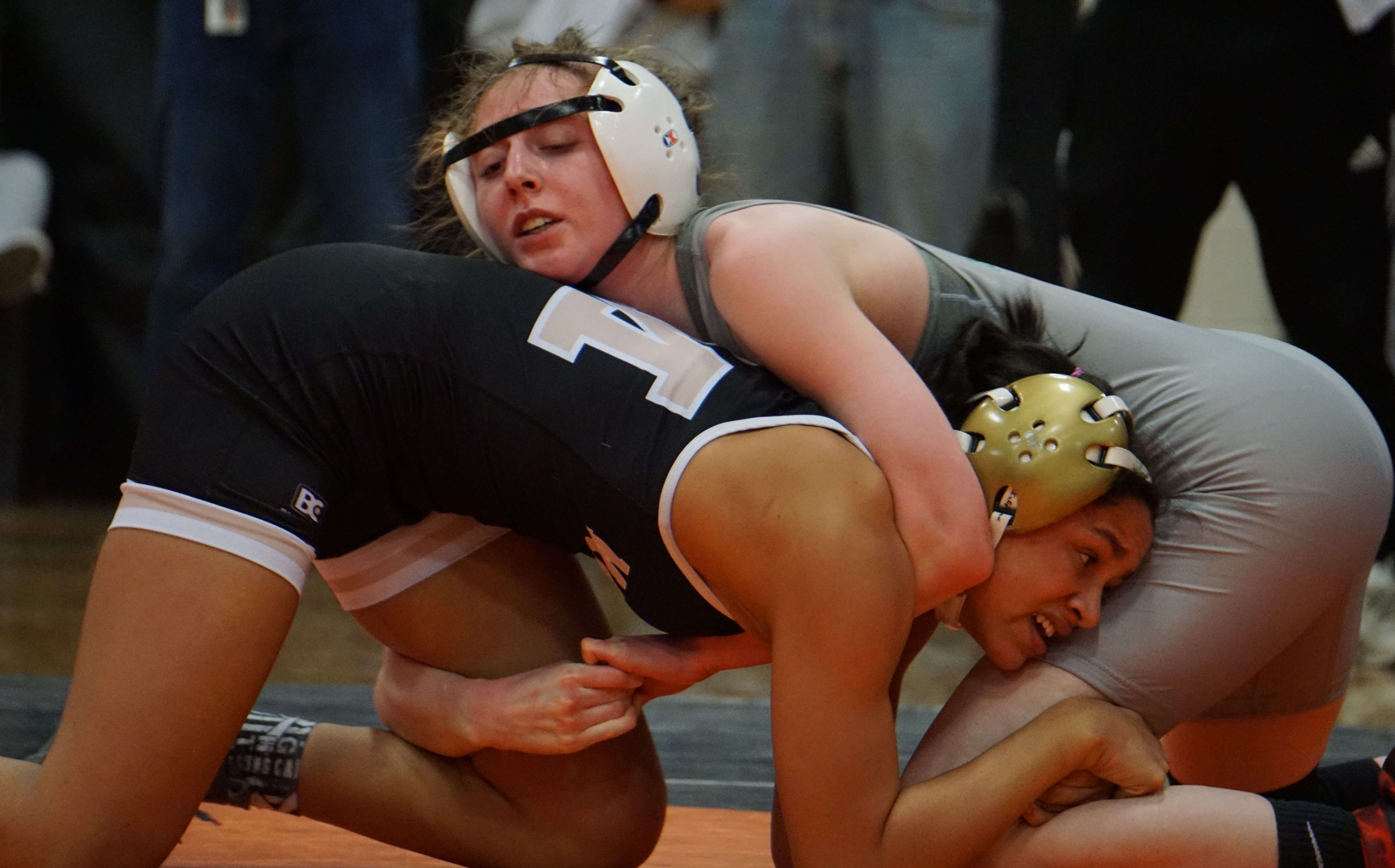 Mid-Buchanan's Haley Sampson battles against Marceline's Peyton Weese in the 117-pound championship match during the Class 1 Section 4 meet at Platte County High School on Saturday. Photo by Tommy Rezac.