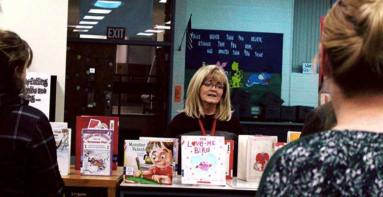 O'Loughlin Elementary School Principal Vicki Gile gives a school tour to school board members. Gile will retire at the end of June. File photo