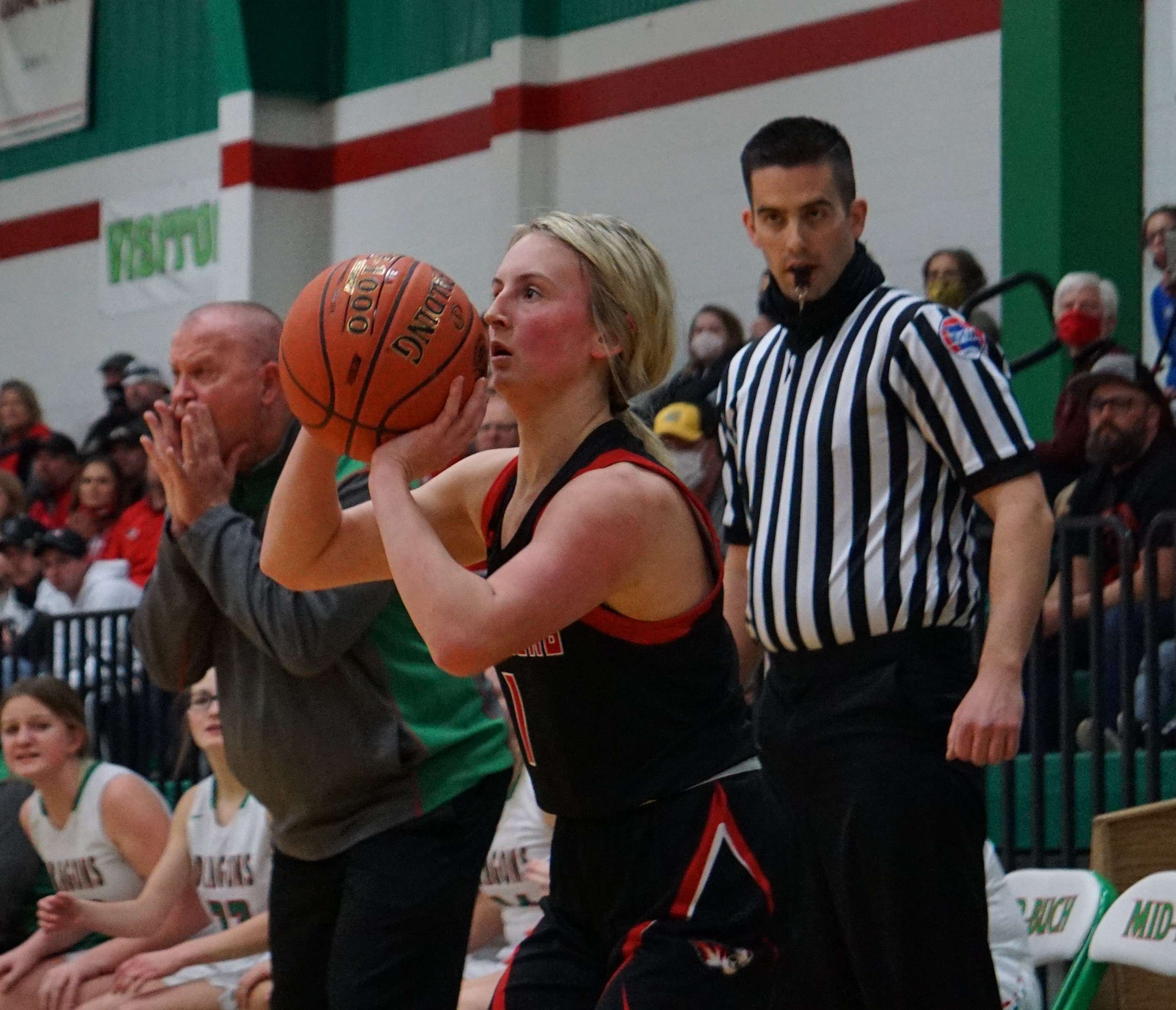 Plattsburg's Tori Wade lines up for a corner three-pointer in the first half of Plattsburg's 51-46 win over Mid-Buchanan in Friday's Class 2 District 15 championship. Photo by Tommy Rezac.