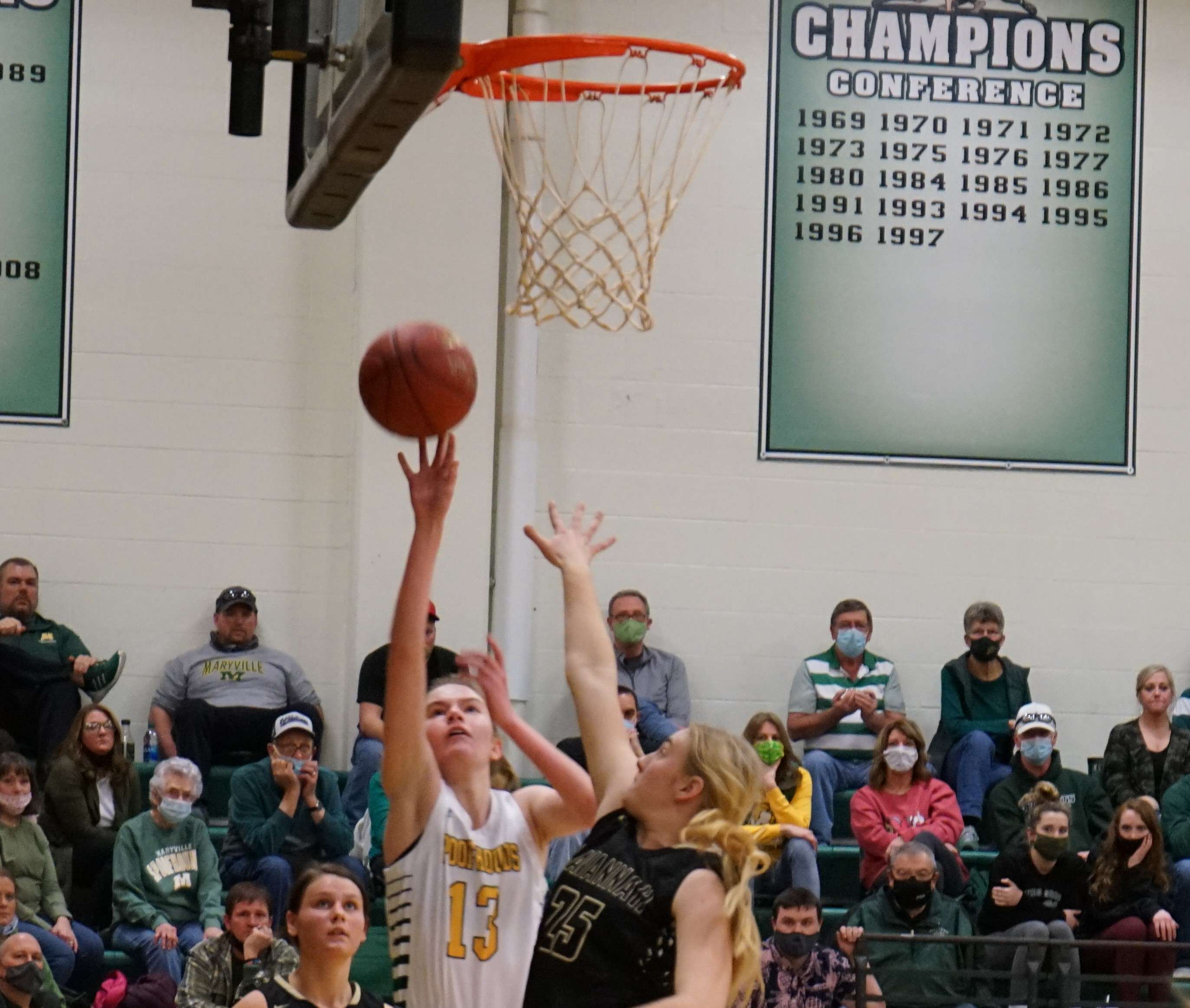 Maryville's Ava Dumke (13) goes up for two in the second half of the Spoofhounds' 60-42 win over Savannah in a Class 4 District 16 semifinal Tuesday. Photo by Whitnee Ice.