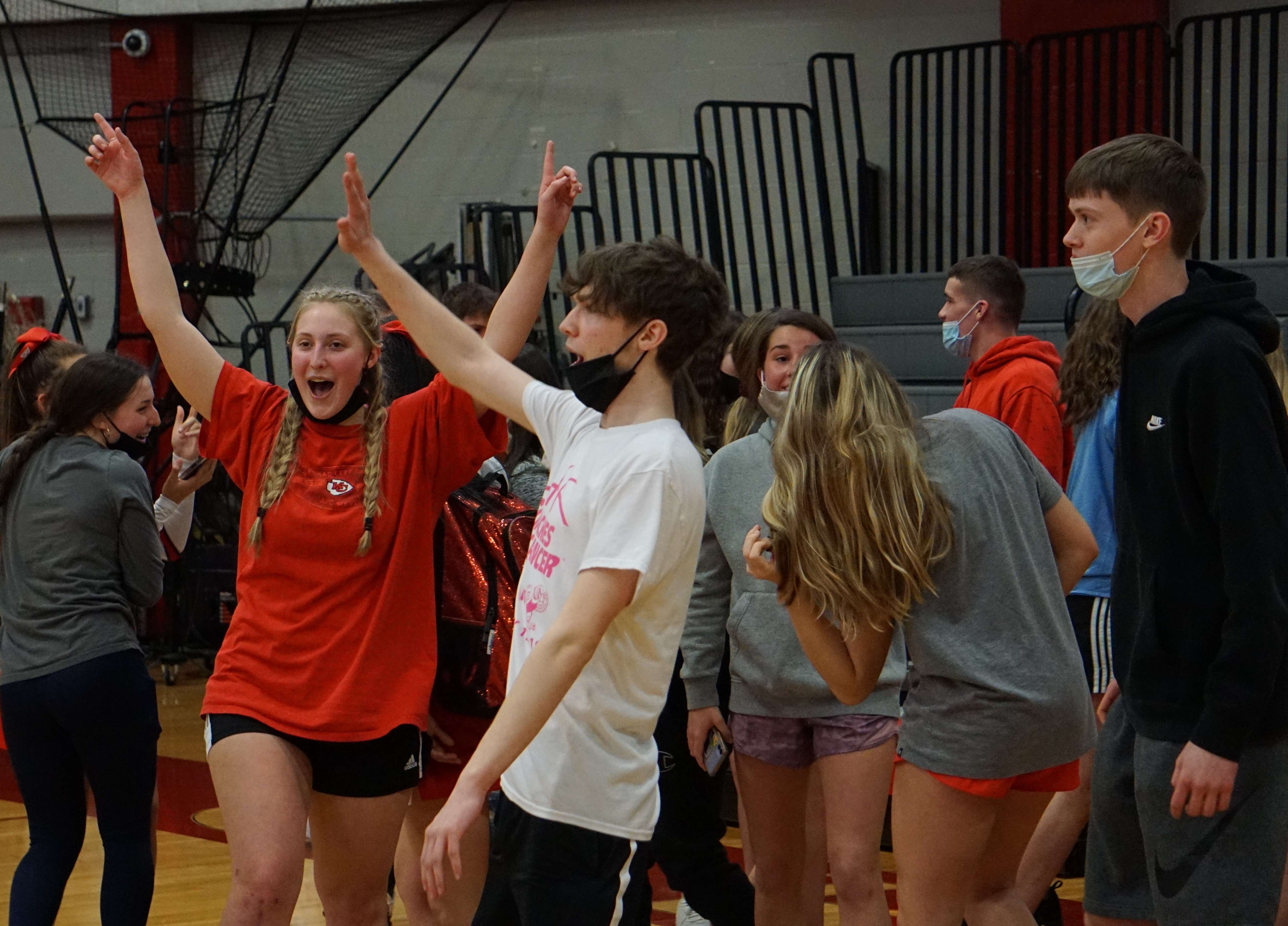 Members of the Benton student section celebrate after the Cardinals' 53-48 win over Maryville in the district semifinal Wednesday. Photo by Tommy Rezac.