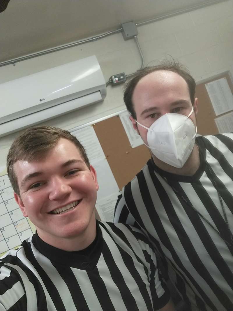 Fort Hays State University graduate student Will Fried, right, officiating a basketball game. Fried has Asperger's syndrome, which is a form of autism. Courtesy photo