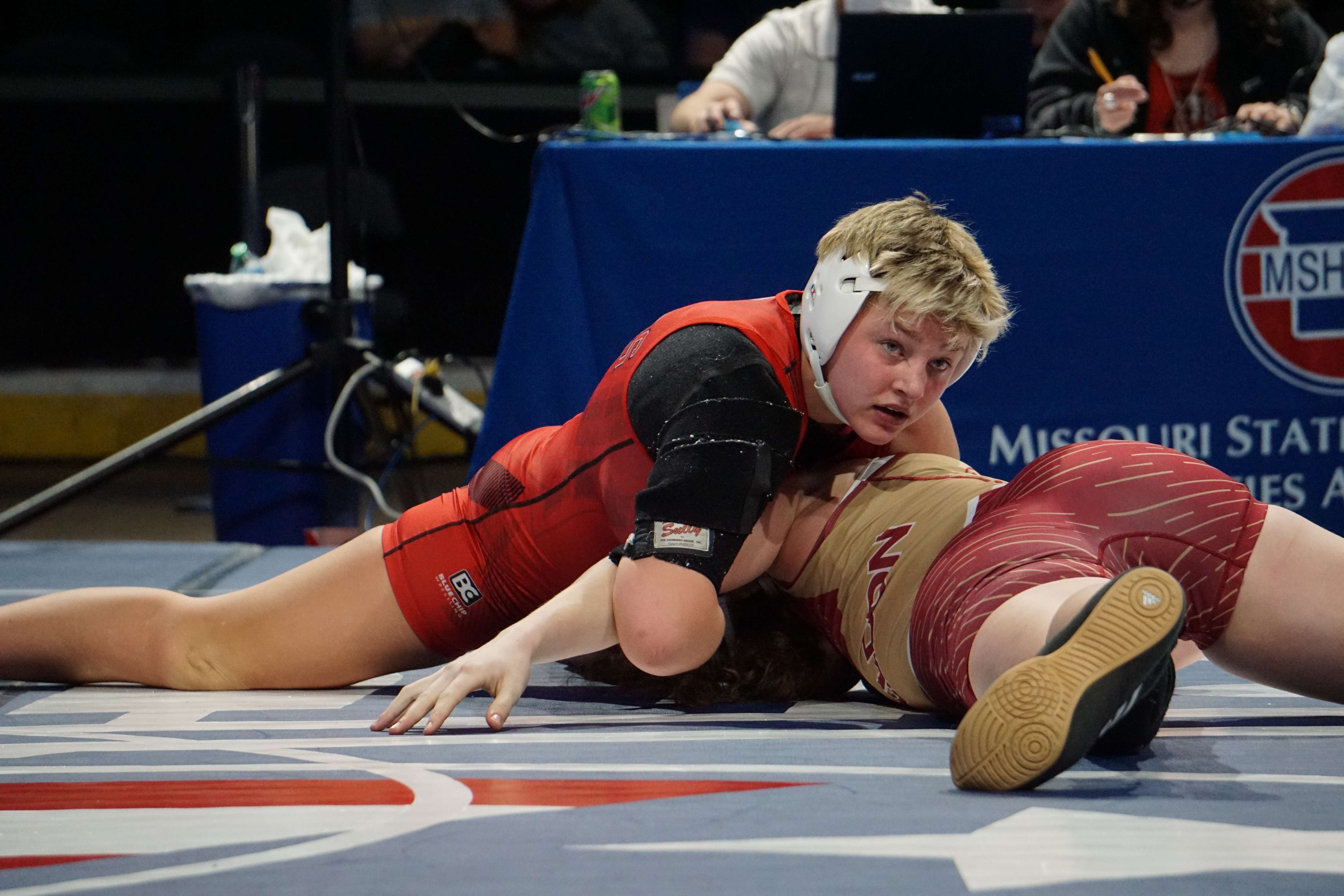 Josie Wright controls Olivia Chapman late in the third period of her third-round wrestleback match on Tuesday at Cable Dahmer Arena in Independence. Photo by Tommy Rezac.