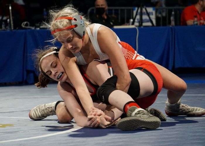 Benton's Lexi Petersen battles against Aiva Mayer of Carrollton in the 3rd place medal match at girls' state wrestling. Photo by Tommy Rezac.