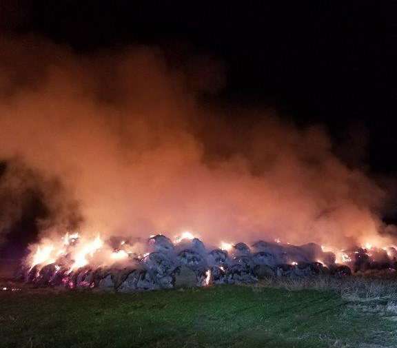 <b>Some of the 400 round bales on fire south of Kipp.</b> Photos courtesy Saline County Sheriff's Office