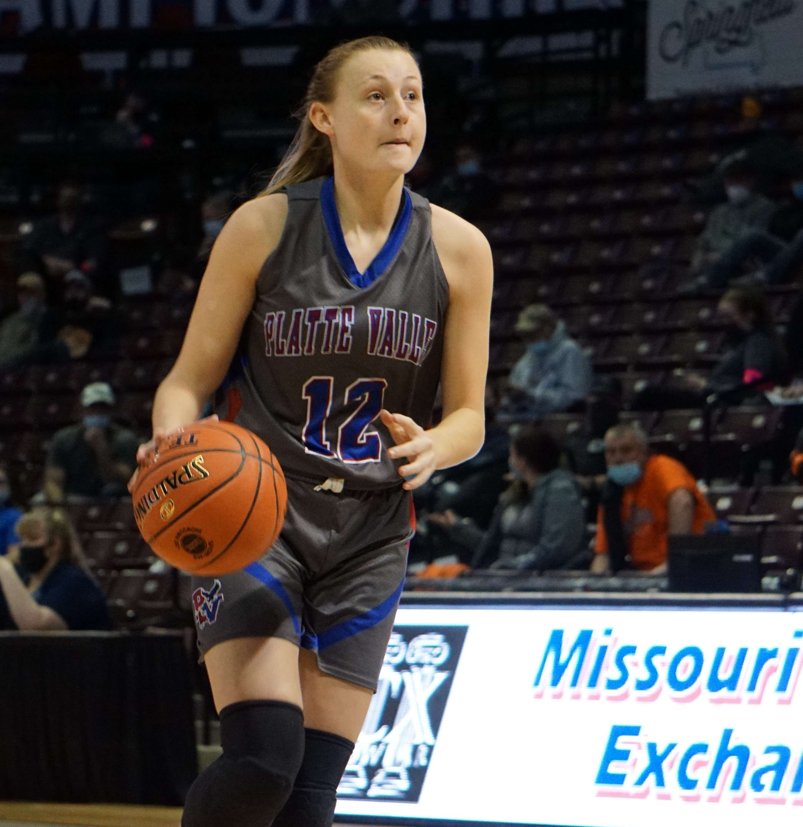 Paige West brings the ball up the floor in the first half.