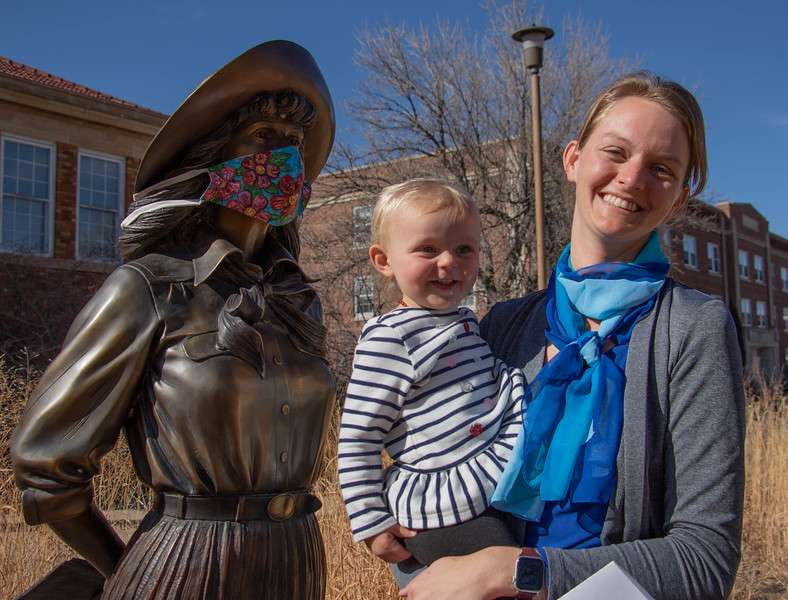 Self-taught artist and software engineer Rachel Brownlee, right, poses with her daughter by the statue of her great-great aunt Mari Sandoz March 5. Brownlee's art will be on display in the Sandoz Center March 15-May 21, 2021. (Tena L. Cook/Chadron State College)