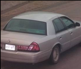 Photo of the victim's Mercury Grand Marquis with Kansas tag number 834 NPD