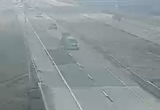 Eastbound vehicles traveling through the smoke on I-70 at Abilene just after 2:15p.m. on Sunday-image KanDrive