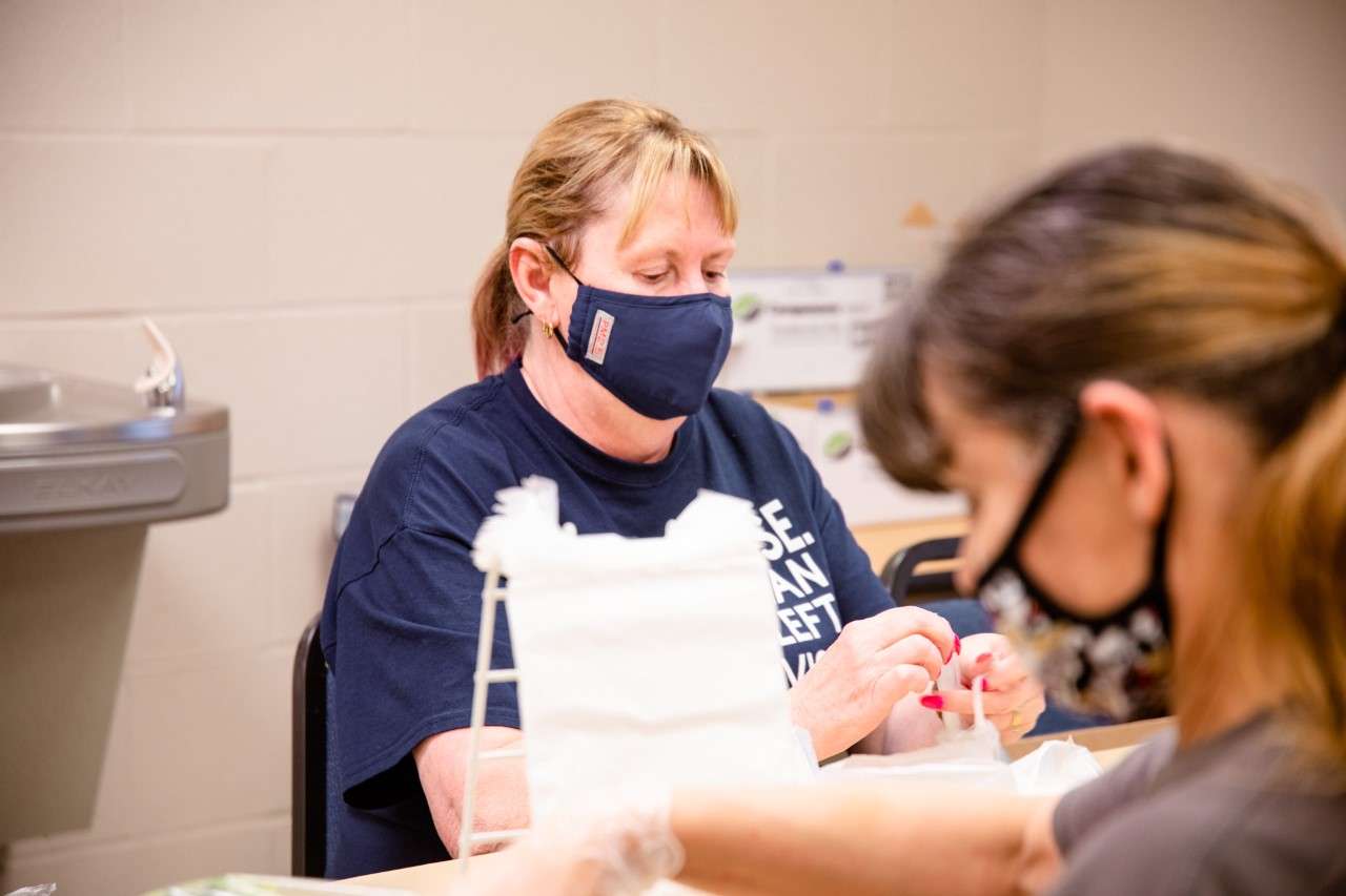 Central&nbsp; Kitchen staff prepare lunch for students