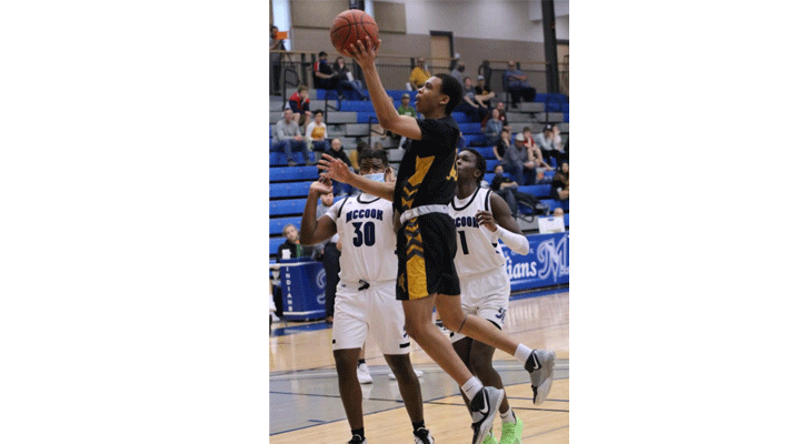 Jevarrick Butler goes in for a layup as Cortland Blake and Julian Lual look on during the first half of action at the Peter &amp; Dolores Graff Events Center.&nbsp;<i>(Photo Credit: Brent Cobb, McCook Community College Sports Information Director)</i>