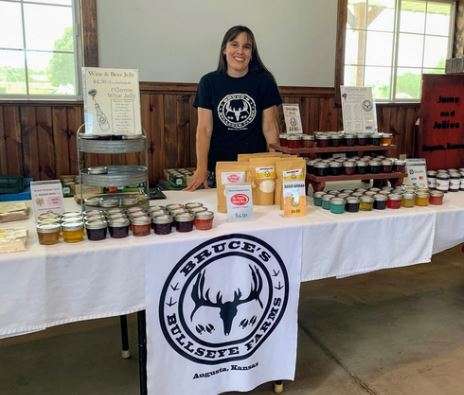 <b>Laurie Bruce with some of the homemade jams and jellies.</b> Photo courtesy KSRE
