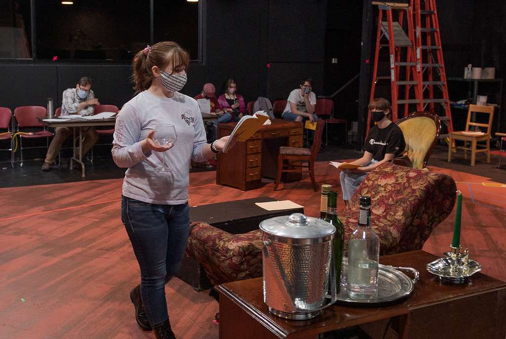 Olivia Freeze, foreground, and Halle Smith, right, rehearse a scene for "To Die For" on March 29, 2021, at Memorial Hall. (Photo by Daniel Binkard/Chadron State College)