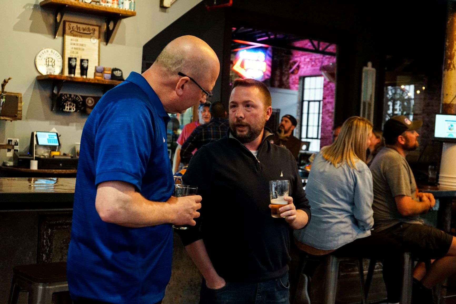 Incumbent Rick Gehring and community member Mike Moore converse as the polls come in / Photo by Whitnee Ice