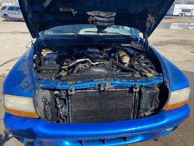 <b>The fire was contained in the engine compartment of this Dodge Durango.</b> Photo courtesy Saline County Sheriff's Office
