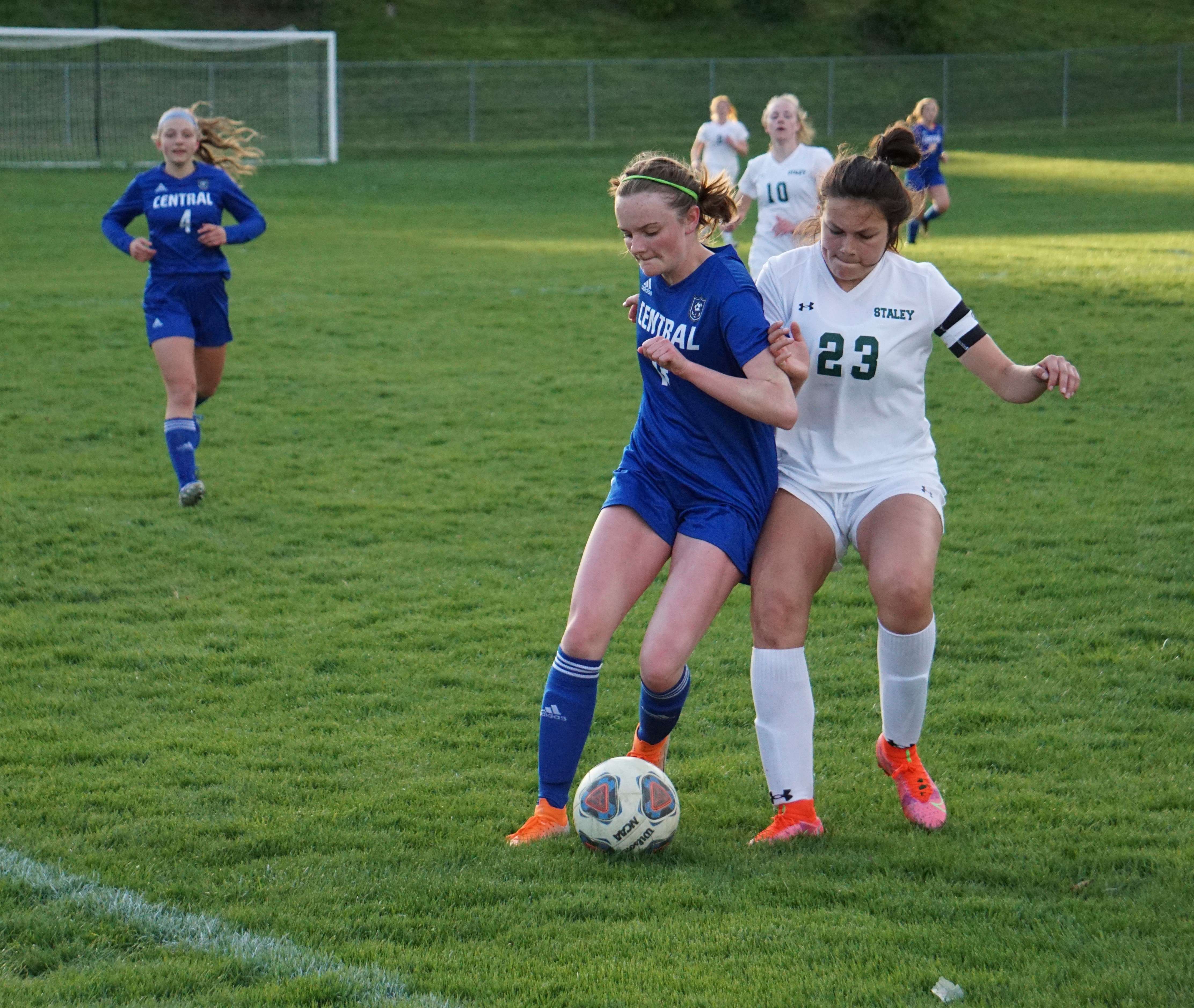 Greycie Bardo tries to work the ball away from Staley's Izzy Gonzalez during Thursday's match. Photo by Tommy Rezac.