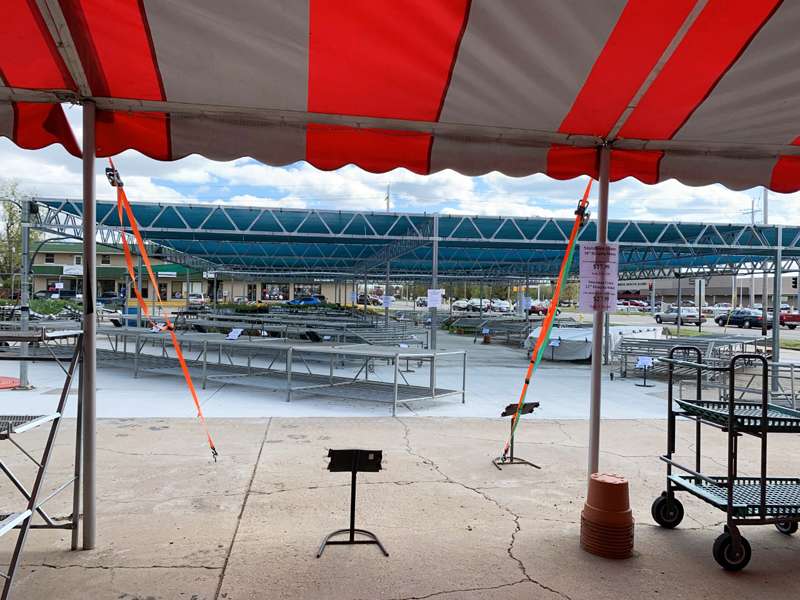 <b>Many of the display tables at Stutzmans were bare Tuesday afternoon. Just a few days ago, they were filled with beautiful plants, and they will be again later this week once the temperature begins to warm, Ben Miller said.</b> Salina Post photo