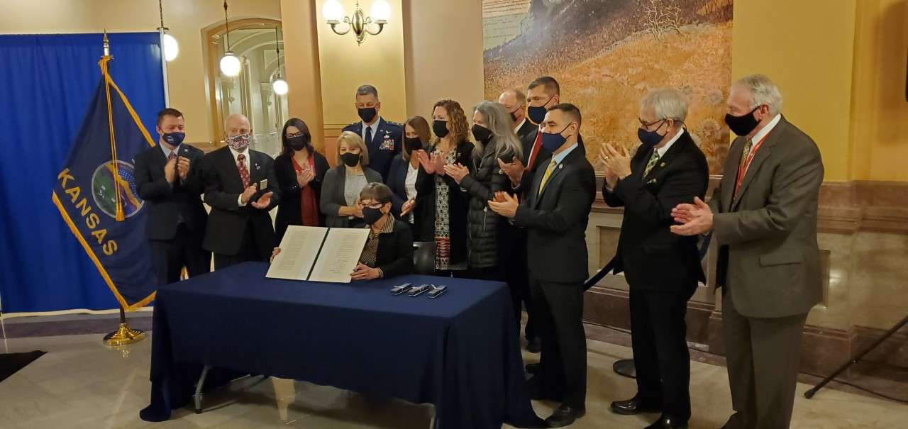 Bill signing ceremony with Gov. Kelly at the State Capitol
