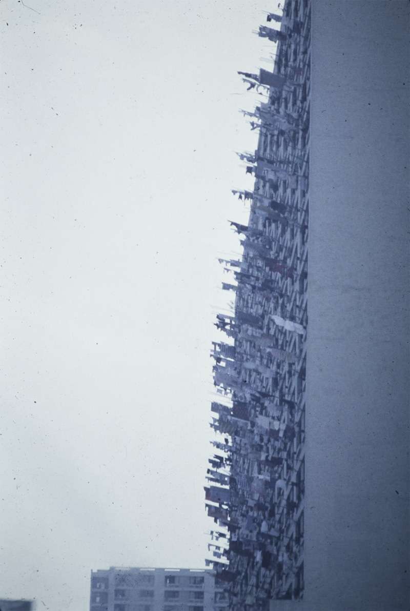 <b>On a sunny day, laundry goes out on a pole to dry. Clothes dryers require too much energy.</b>