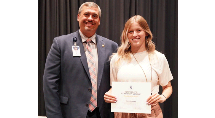 <i>Mid-Plains Community College President Ryan Purdy presents the Presidential Award to Erica Hopping, of Sutherland, during the North Platte Community College Honors Convocation Monday in NPCC’s McDonald-Belton Theater.</i>