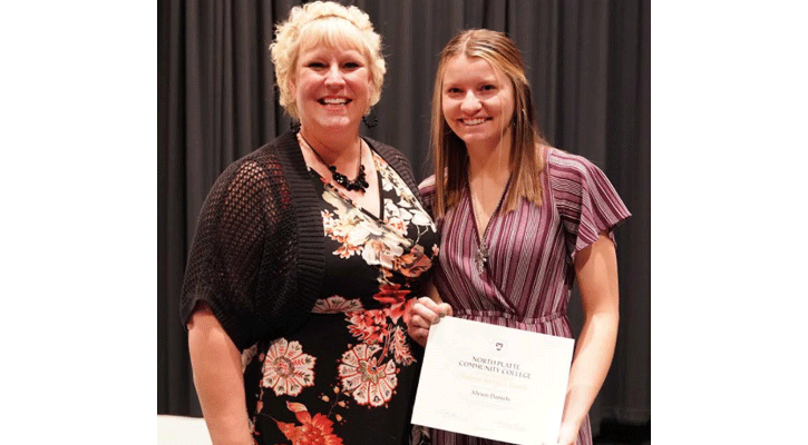 <i>Area Vice President of Student Affairs Kelly Rippen presents the Vice President of Student Services of the Year Award to Alysen Daniels, of Mullen, during the North Platte Community College Honors Convocation Monday in NPCC’s McDonald-Belton Theater.</i>