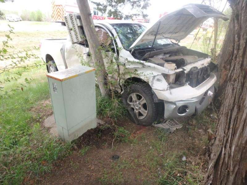 <b>The Tundra came to rest against some trees and a pole.&nbsp;</b>