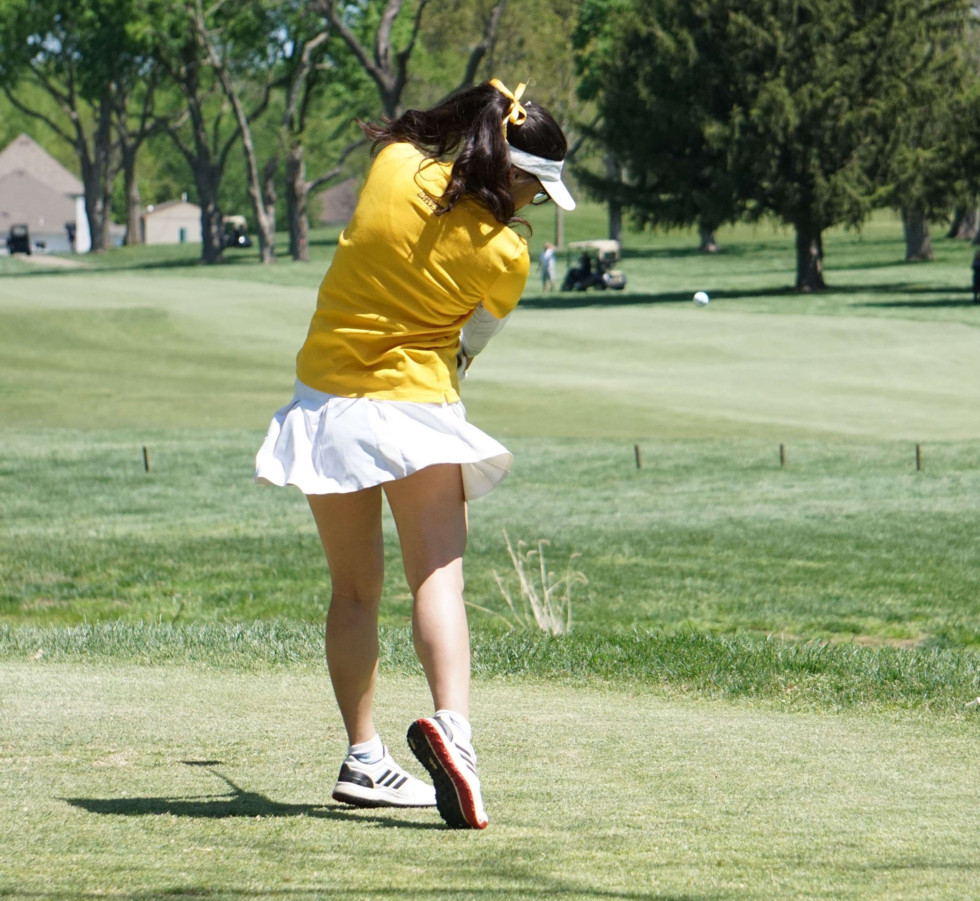 Allycia Gan drives a ball off the tee on the back nine of Wednesday's NCAA Central Regional. Photo by Tommy Rezac.