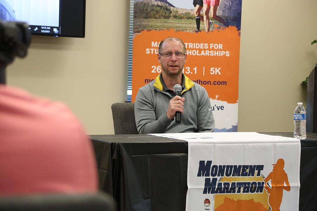 John Seiler, of Gering, speaks at Wednesday's Monument Marathon Press Conference. Seiler is one of the four runners registered for the 2021 Monument Marathon that have participated all 10 years.