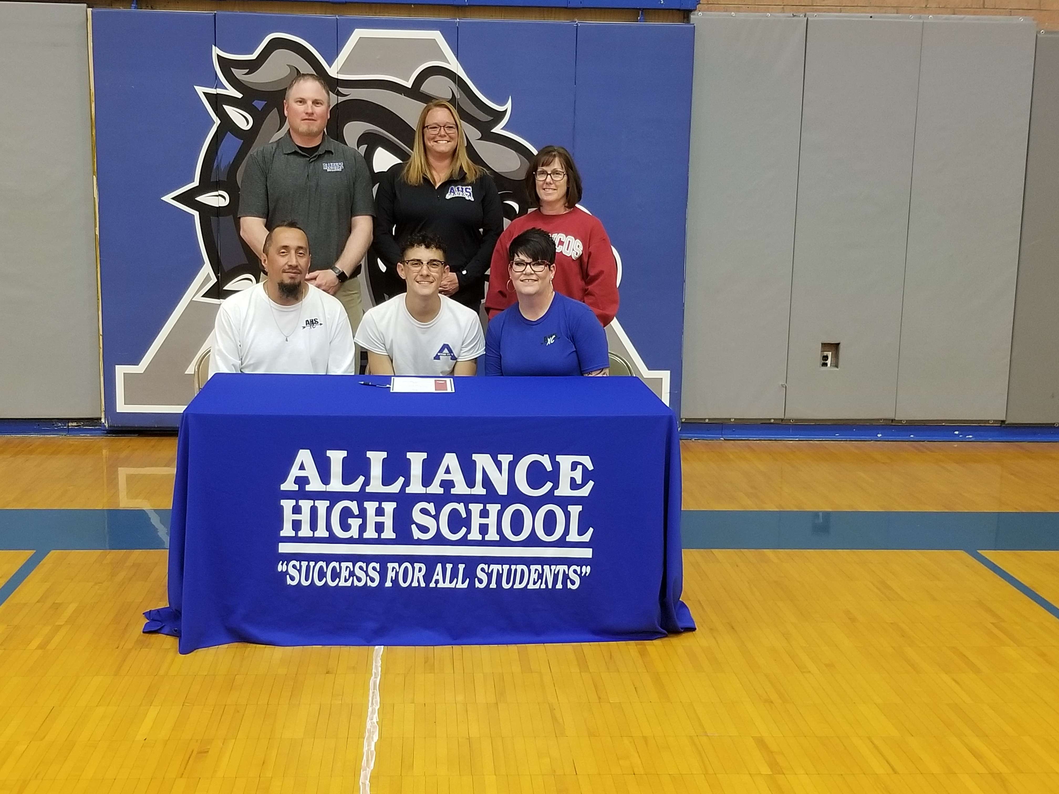 Front L-R: Abe Garcia, Alec Garcia, Amber Jacobs.&nbsp; Back L-R:&nbsp; AHS Head Track Coach Nate Lanik, Coach Kelly Erickson, Coach Angie Hiemstra