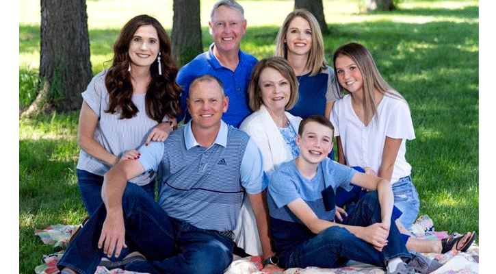 The Reinert family: Rich and Chris, and their daughters Amanda Reinert and Andrea and Ryan Hayes, plus grandchildren Ashlyn and Logan, share a family moment. Rich volunteers at the Buffalo Bill Rodeo in North Platte. Photo courtesy Amy Minchel, A Moment Photography.