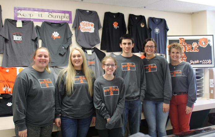 <b>The staff at the Roar Store, from left: Ella Rice, website manager; Kinzlee Wallace, office manager; Caylyn Pfizenmaier, advertising manager; Ty Pfizenmaier, production manager; Clara Edwards, project manager; Rhonda Gierhan, CEO and instructor.</b> (Submitted) 