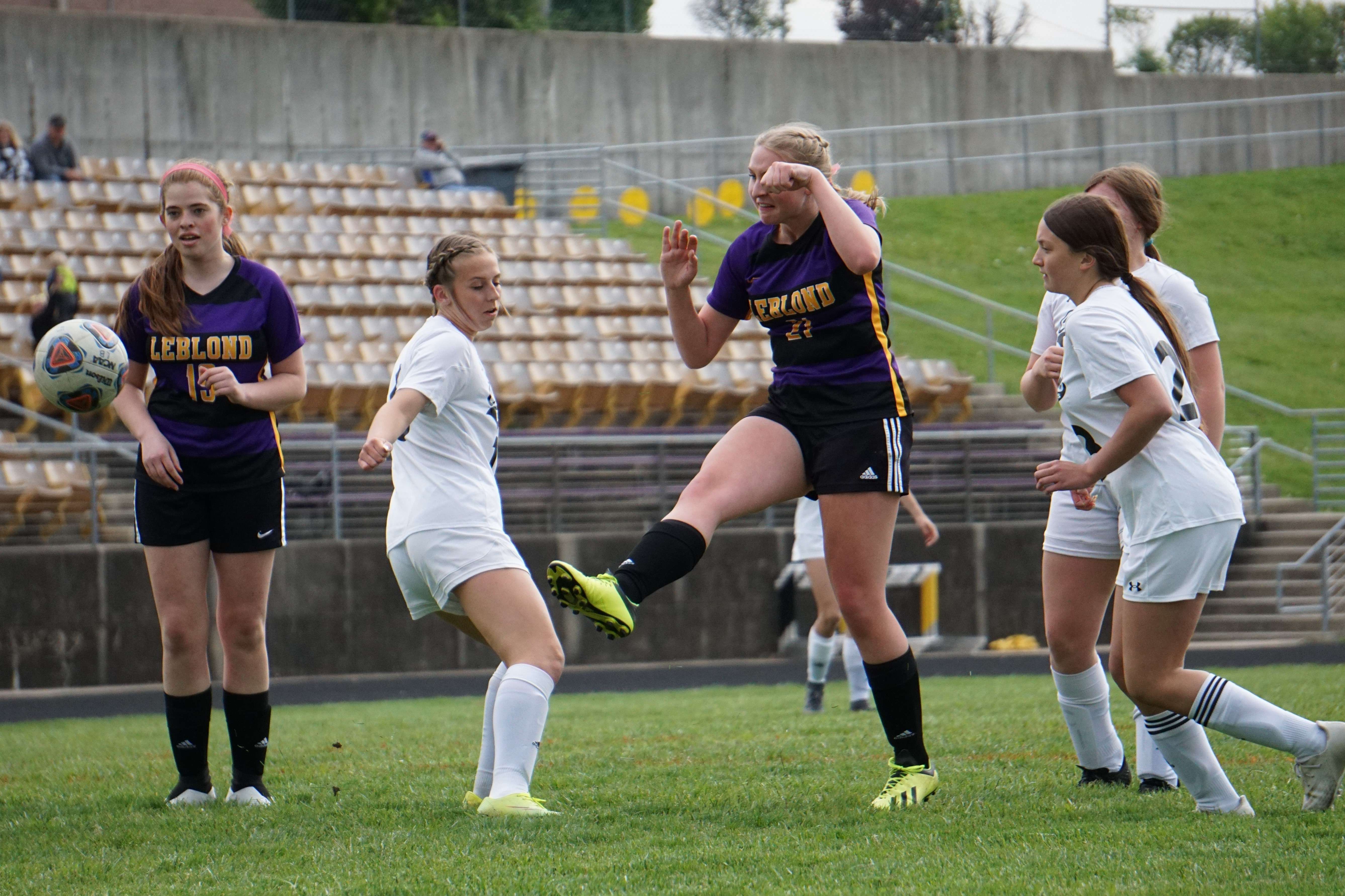 LeBlond senior Tessa Pinkelman sends a ball toward the goal in the first half of the Eagle's 9-1 win over Cameron Thursday. Photo by Tommy Rezac.