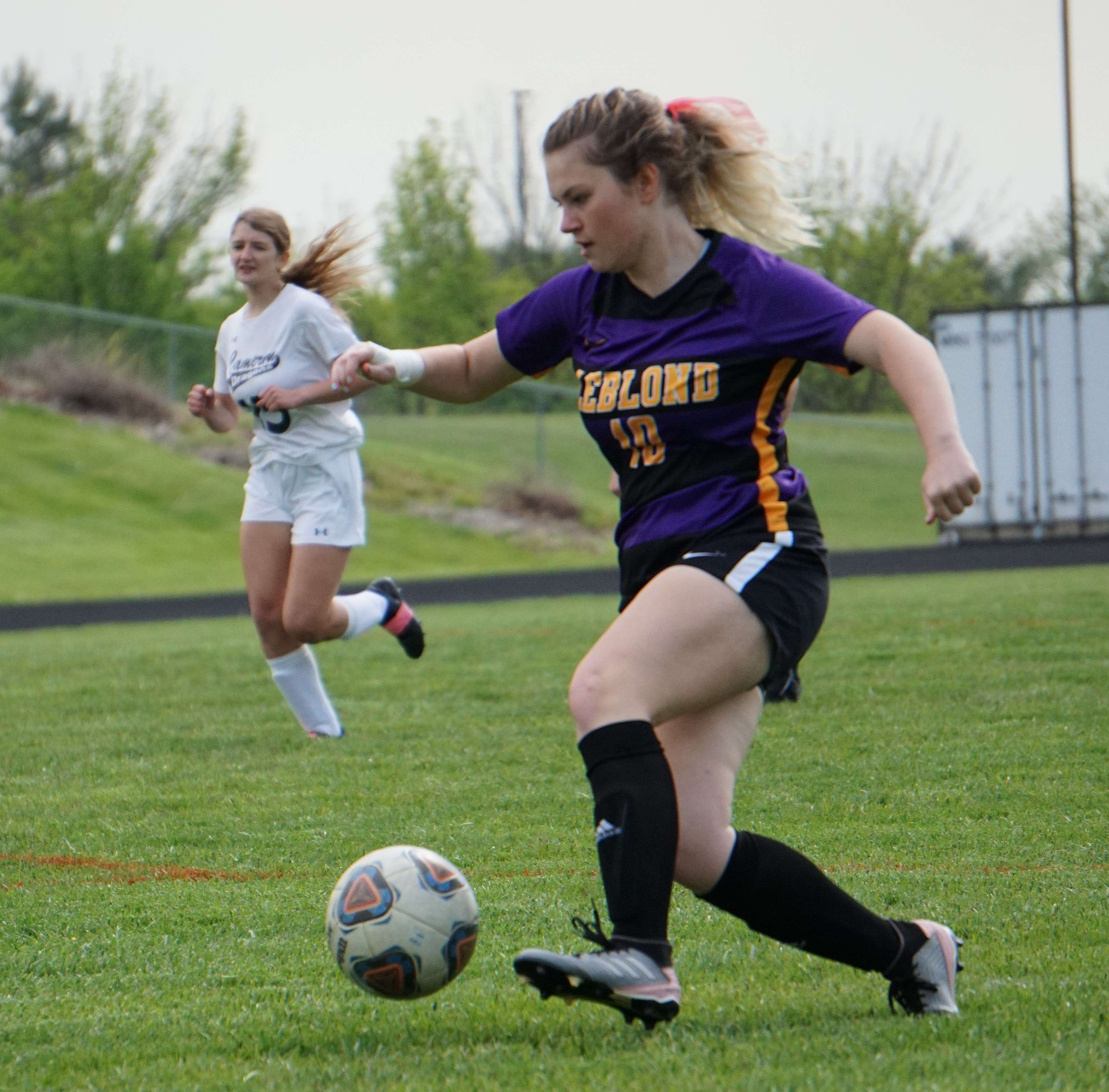 Senior Reese Robertson dribbles a ball in the first half of LeBlond's 9-1 win over Cameron Tuesday. Photo by Tommy Rezac.