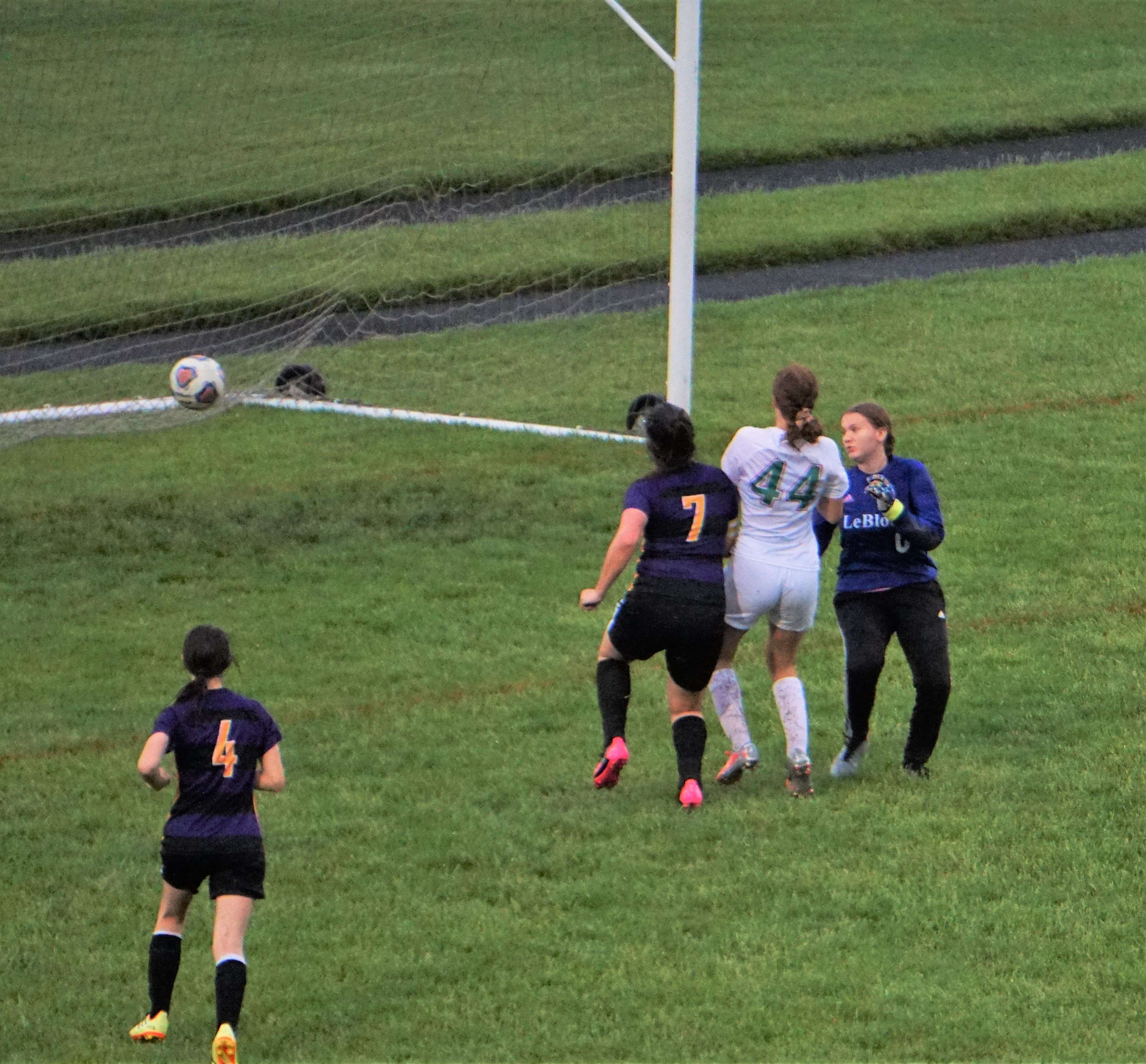 Mid-Buchanan's Emily Parrott (44) puts a ball in the goal in the first half of Thursday's Class 1 District 8 title game. Photo by Tommy Rezac.