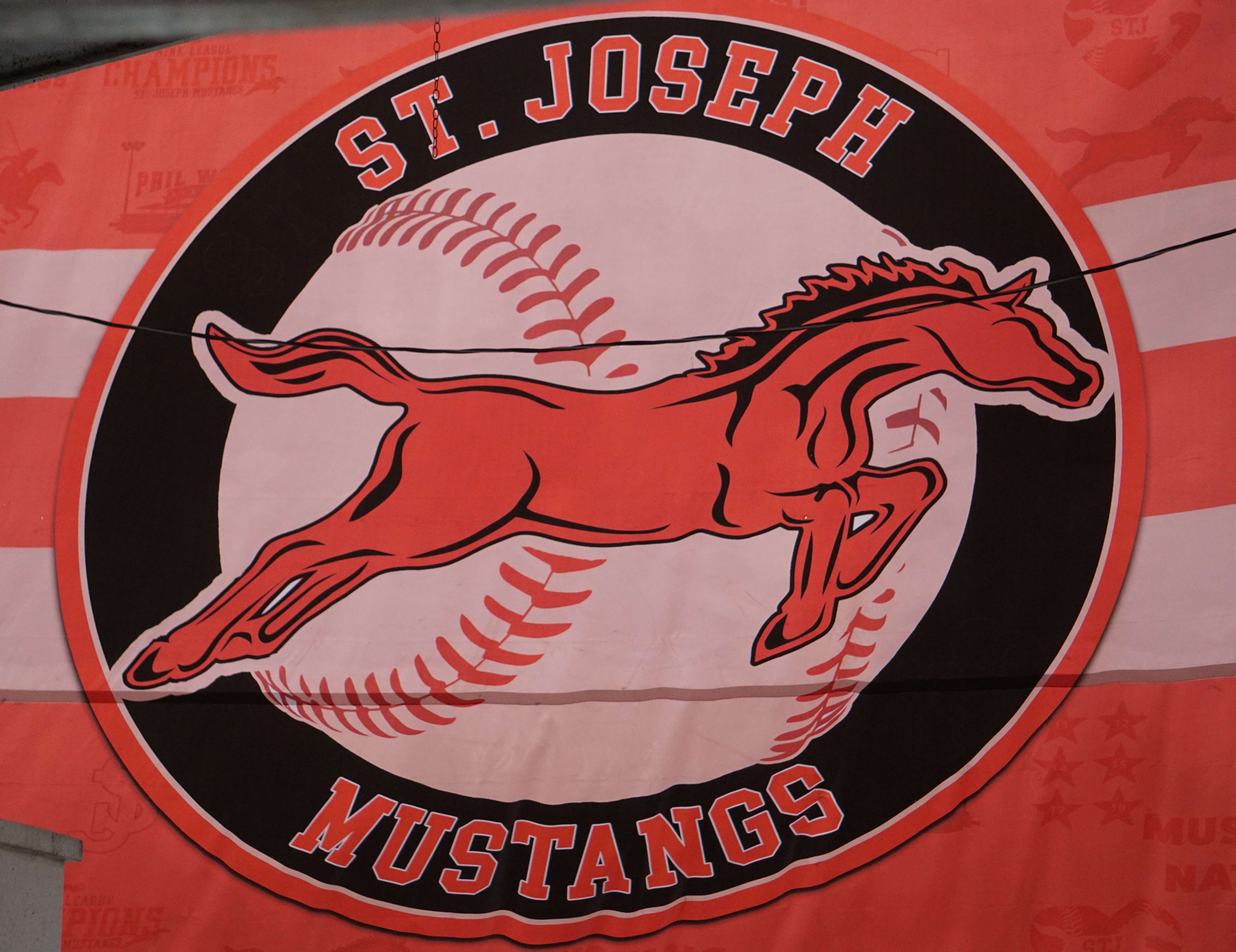 This large Mustangs banner hangs in the main entryway at Phil Welch Stadium. Fans will see it as they make their way in from the concourse. Photo by Tommy Rezac.