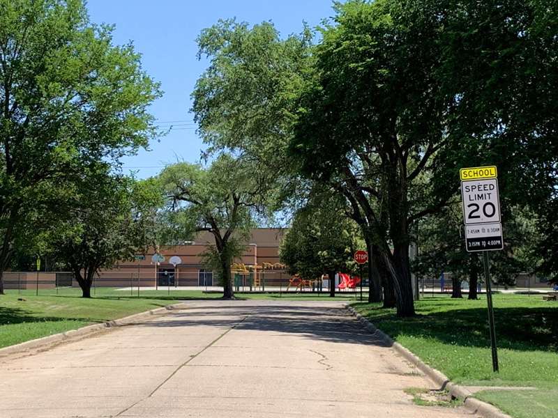 <b>A sign marking the beginning of the school zone on E. Ellsworth Avenue west of Heusner Elementary School.</b> Salina Post photo