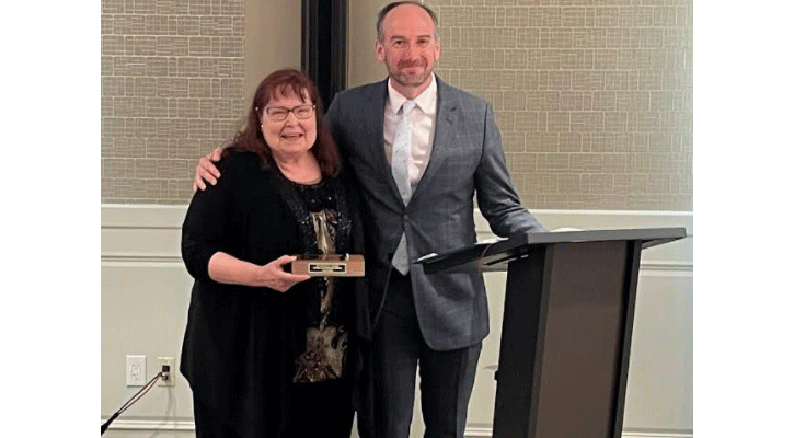 <i>Jean </i><i>Condon, business and office technology instructor for Mid-Plains Community College, receives the Dr. Donald L. Moore Leadership Award from the Mountain-Plains Business Education Association in Fort Worth, Texas June 15. Presenting her with the award is Dr. DeLayne Havlovic, coordinator of K-12 Career Education and Programming for Omaha Public Schools.</i>