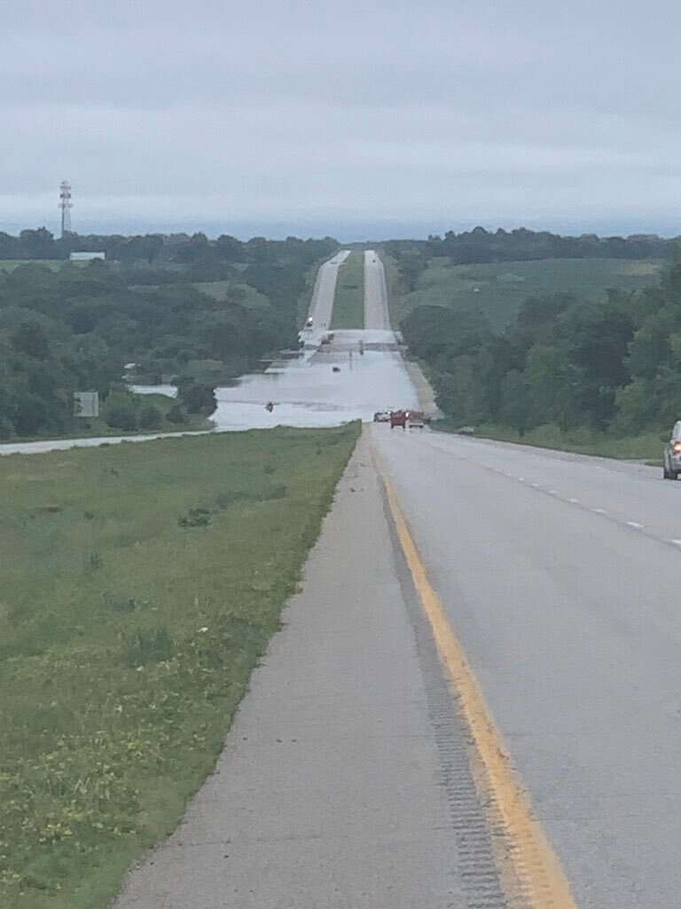 Water covered Highway 36 last week after heavy rains. Photo Courtesy of Troop H