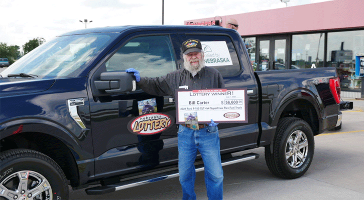 Bill Carter of Cozad won the sixth Ford F-150 truck prize in the 2021 edition of the Nebraska Lottery's $2 Truck$ & Buck$ Scratch game. He was presented with his new truck at an event at Cozad Cenex, 801 S Meridian in Cozad on July 1, 2021.