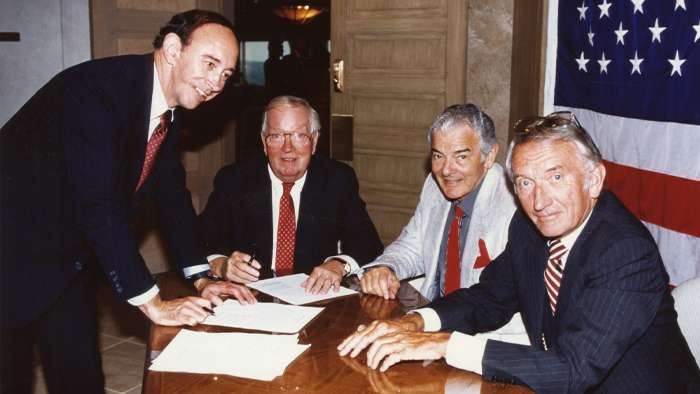 <b>From left: Charles Overby, Martin Birmingham, Al Neuharth and John Quinn at the document signing ceremony establishing the Freedom Forum. </b>Photo courtesy Freedom Forum