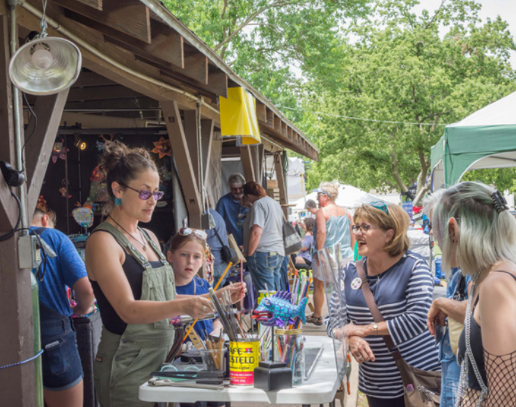 <b>A booth at the Smoky Hill River Festival.</b>&nbsp;Photo courtesy Salina Arts &amp; Humanities&nbsp;&nbsp;