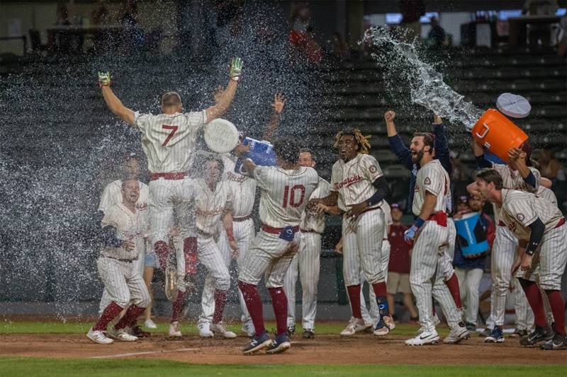 <b>Colin Willis (No. 7) and the Monarchs celebrate the walk off win over Houston.</b> Photo by John Ellis courtesy Kansas City Monarchs