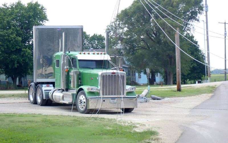 Power lines can be seen on the tractor of this rig in Kipp Thursday afternoon. An Evergy spokesperson said 70 customers lost power for several hours because of the incident.Photo Saline County Sheriff's Office